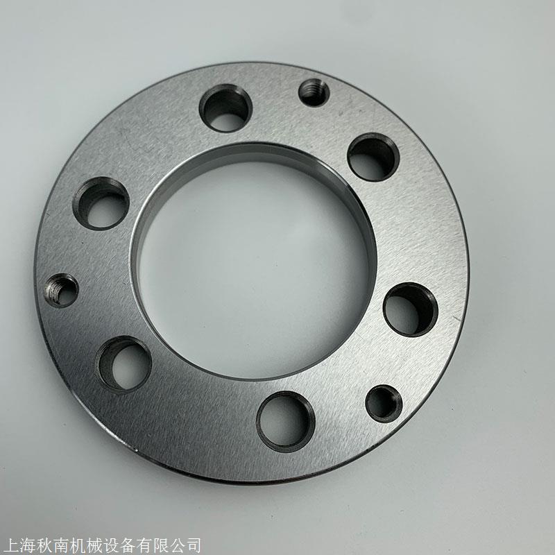 所述盖板顶部固定连接有连接盘